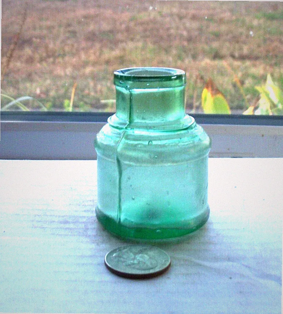 STUNNING GREEN BARREL CRUDELY MADE INK BASE EMBOSSED, A